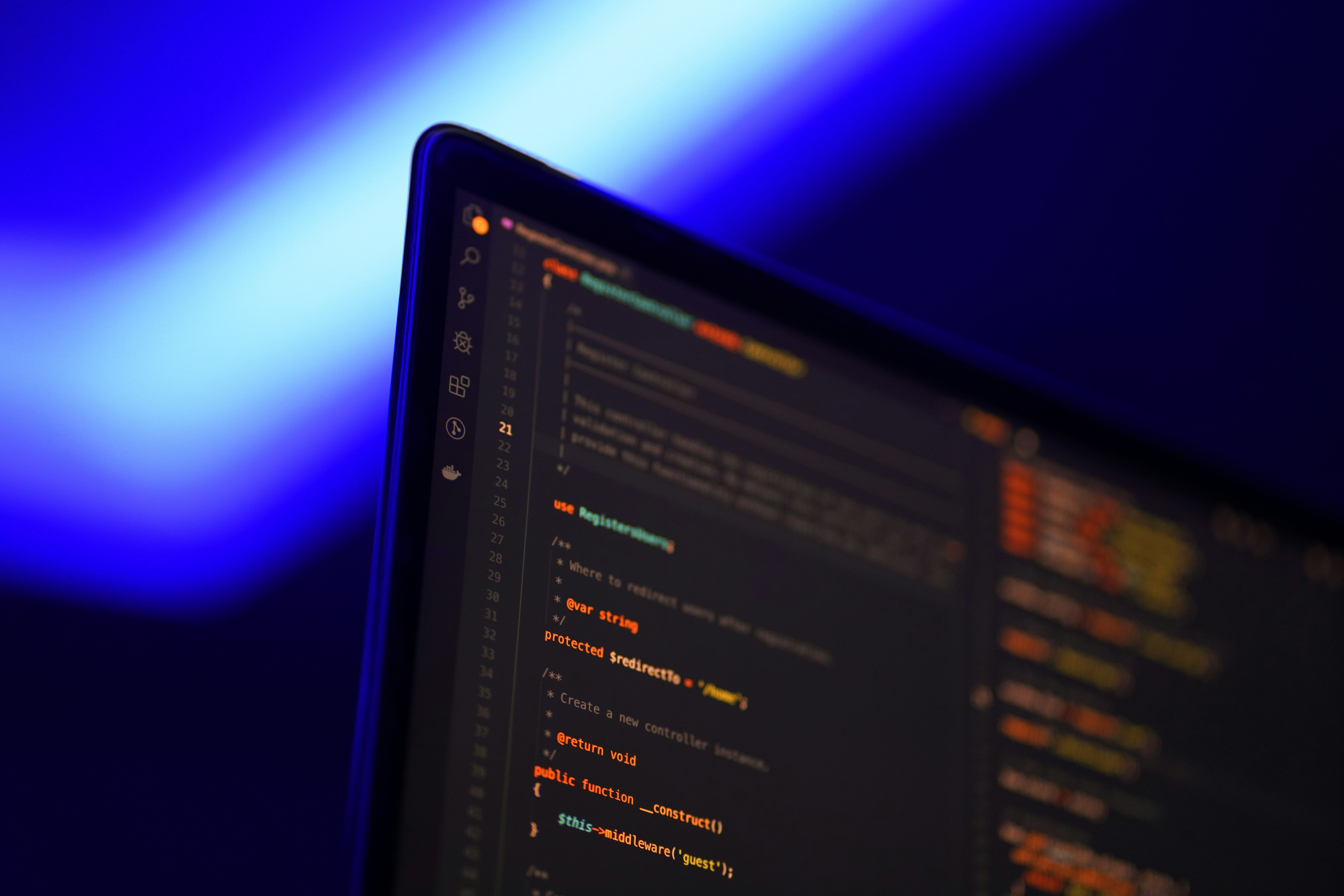 Modern photo of a laptop with code on screen